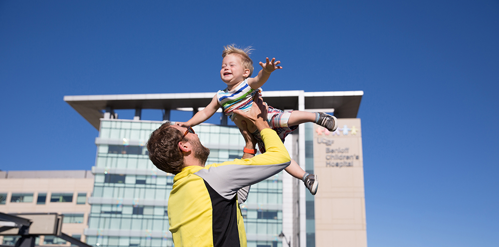 dad playing with child